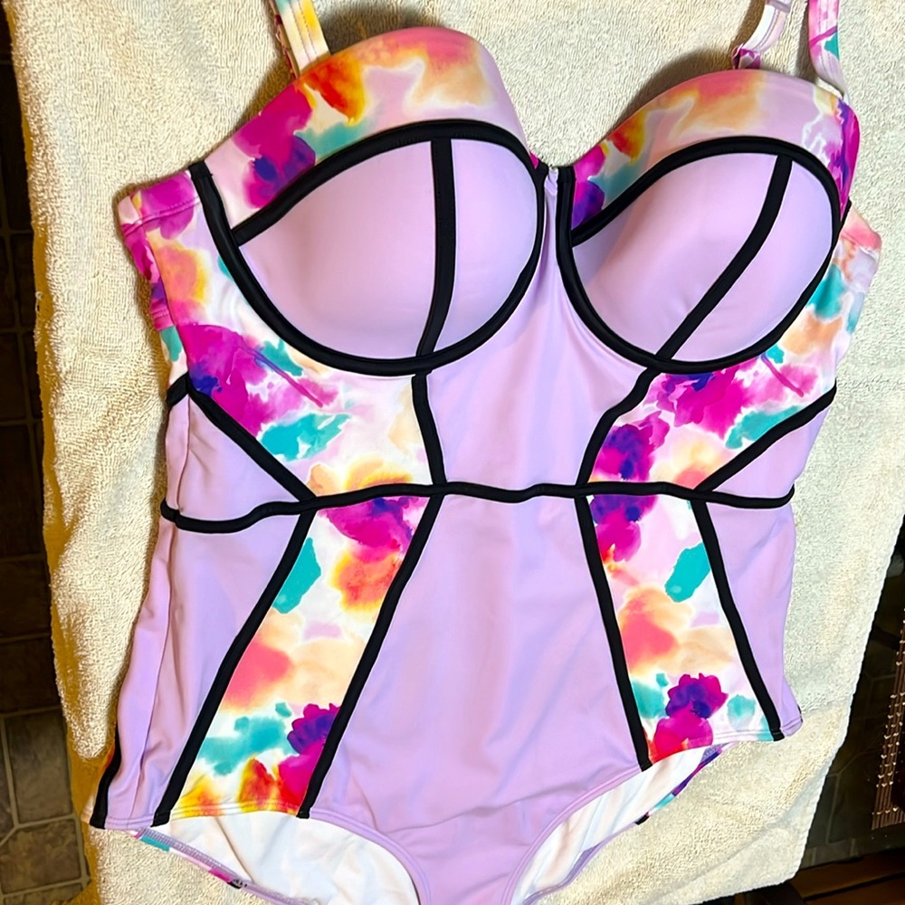 Torrid one piece swimsuit. Offers structure and style with underwire.